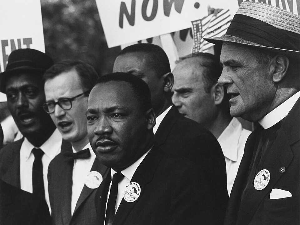 "Martin Luther King Jr. portrait – famous misattributed quote about not rejoicing in death"